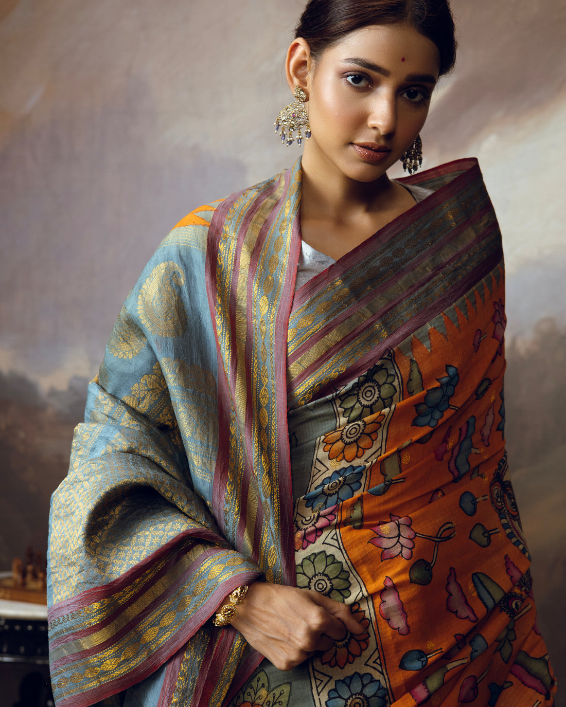 Handdrawn handpainted penkalamkari on silk cotton gadwal saree