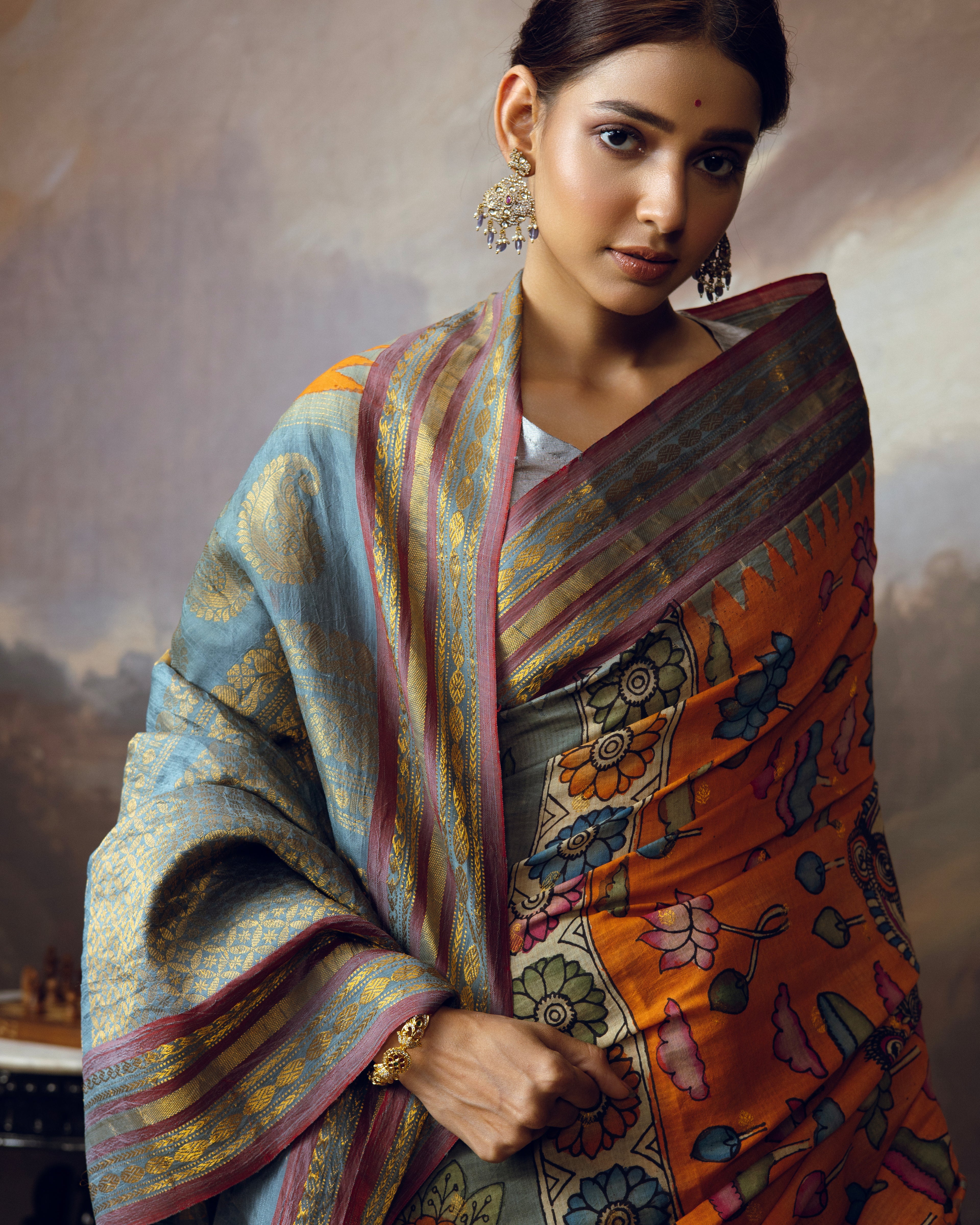 Handdrawn handpainted penkalamkari on silk cotton gadwal saree