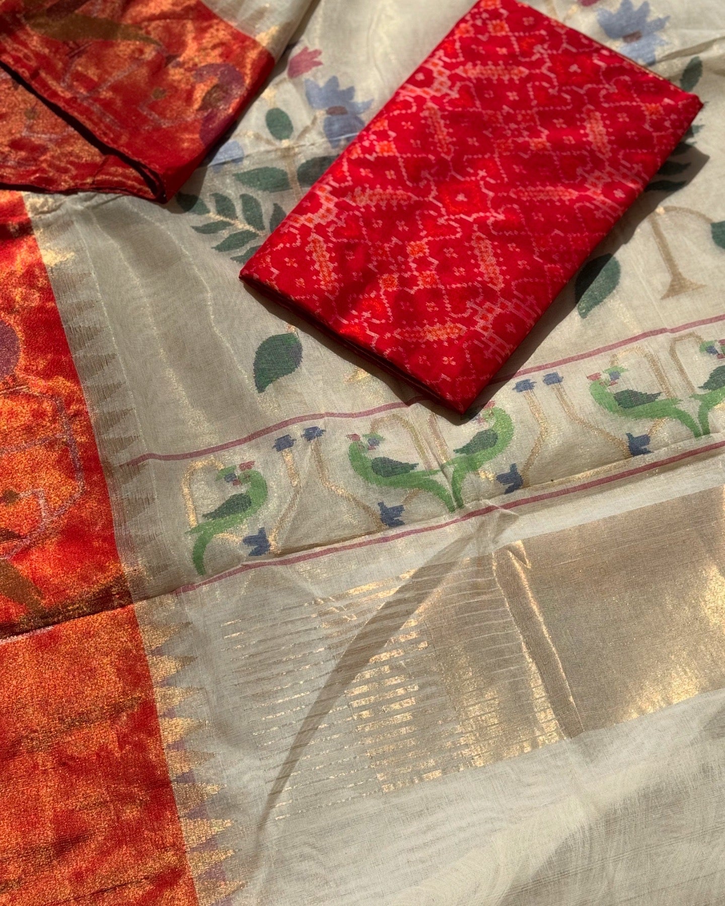 A DESIGNER EXCLUSIVE JAAL WEAVE PONDURU KHADHI WITH TISSUE MUNIYA PAITHANI BORDER WITH PARROT PEACOCK