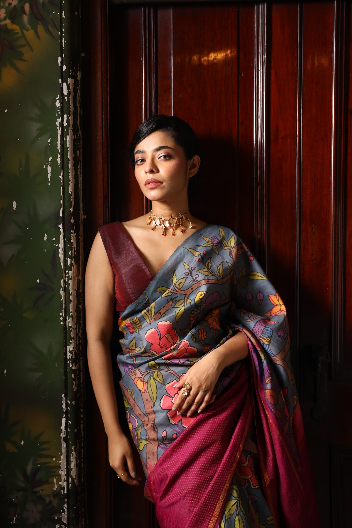 A korvai contemporary kanchivaram silk saree one sided border adorned with chintz penkalamkari