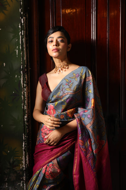 A korvai contemporary kanchivaram silk saree one sided border adorned with chintz penkalamkari