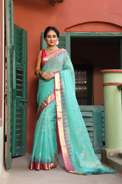 A brand exclusive Seagreen Ponduru khadi Jamdani Handspun with beautiful lotus weave and chevrons