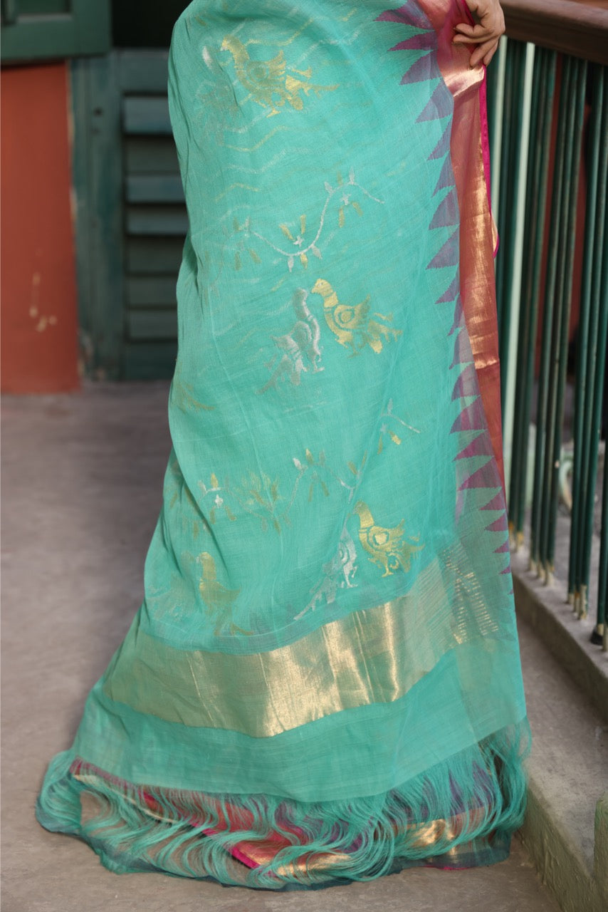 A brand exclusive Seagreen Ponduru khadi Jamdani Handspun with beautiful lotus weave and chevrons