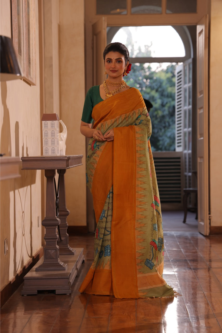 A gorgeous korvai kanchivaram silk saree with handdrawn handpainted penkalamkari Ramayana scripts