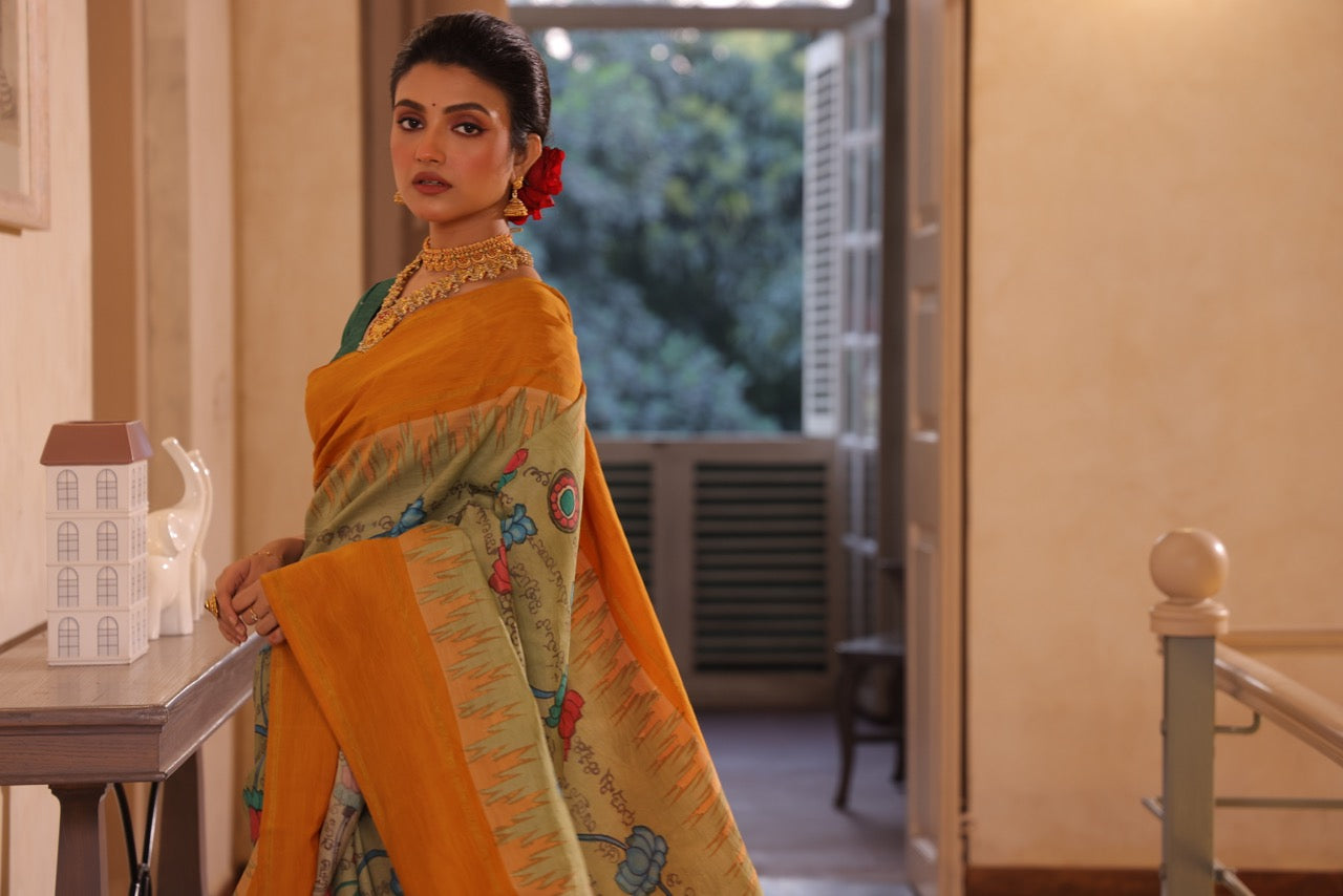 A gorgeous korvai kanchivaram silk saree with handdrawn handpainted penkalamkari Ramayana scripts