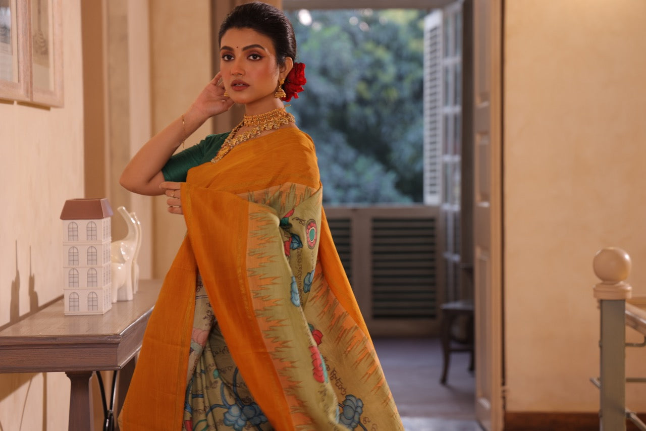 A gorgeous korvai kanchivaram silk saree with handdrawn handpainted penkalamkari Ramayana scripts