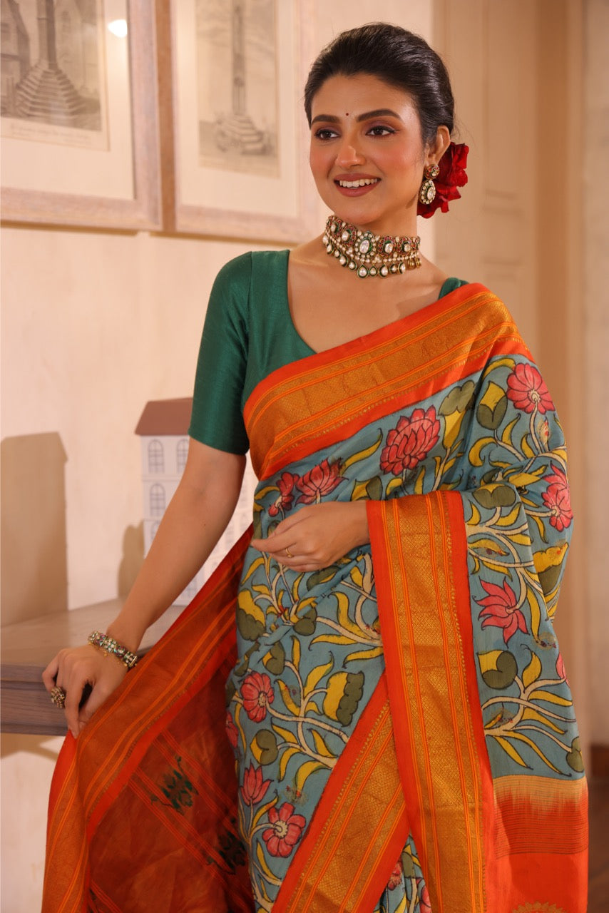 An Uber chic handwoven maharani paithani silk saree with handdrawn and handpainted penkalamkari