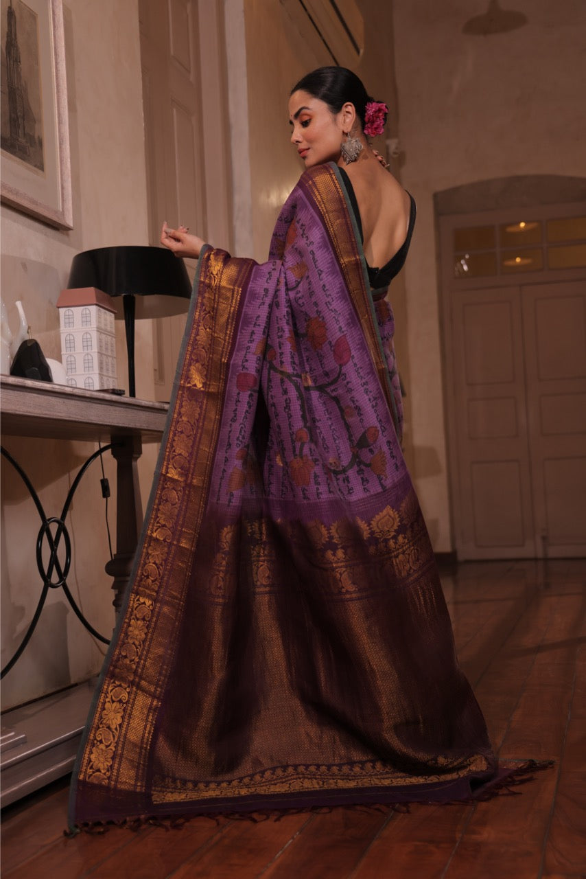 A gorgeous kuttu gadwal silk saree with handdrawn handpainted penkalamkari