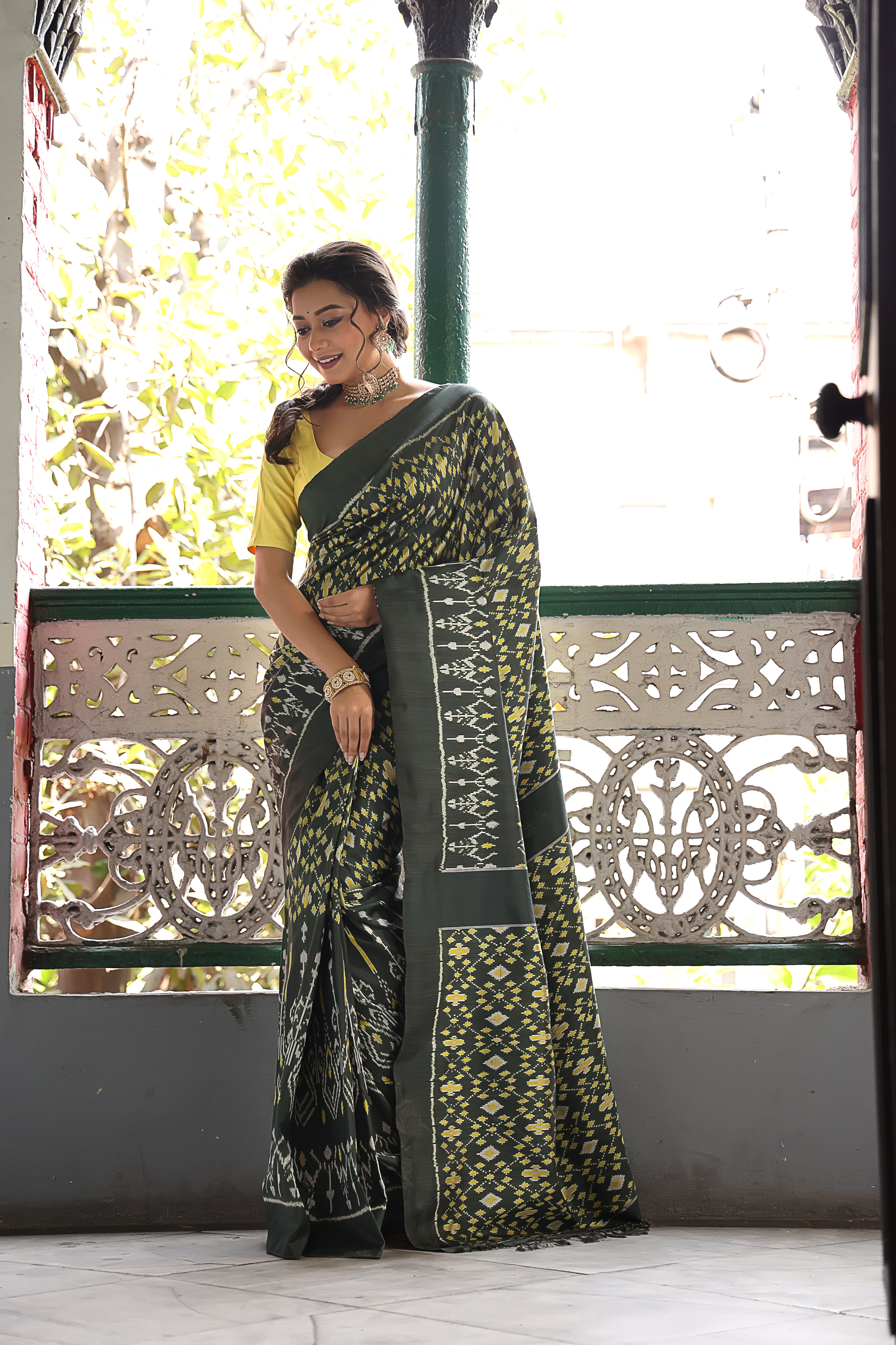 A vivacious Viridian green Cambodian silk ikkat saree - Museum archive piece