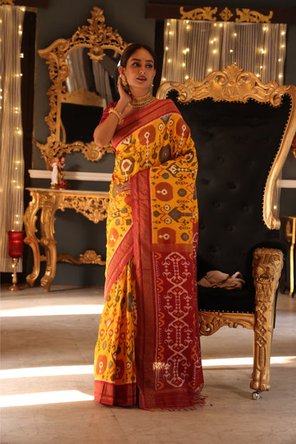 A stunner mustard yellow by deep burgundy premium  tussar by mulberry silk ikkat SAREE