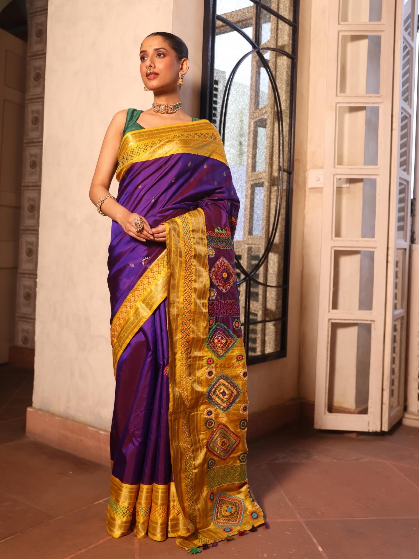 Lambani embroidery with mirror work crafted on pure korvai kanchivaram silk