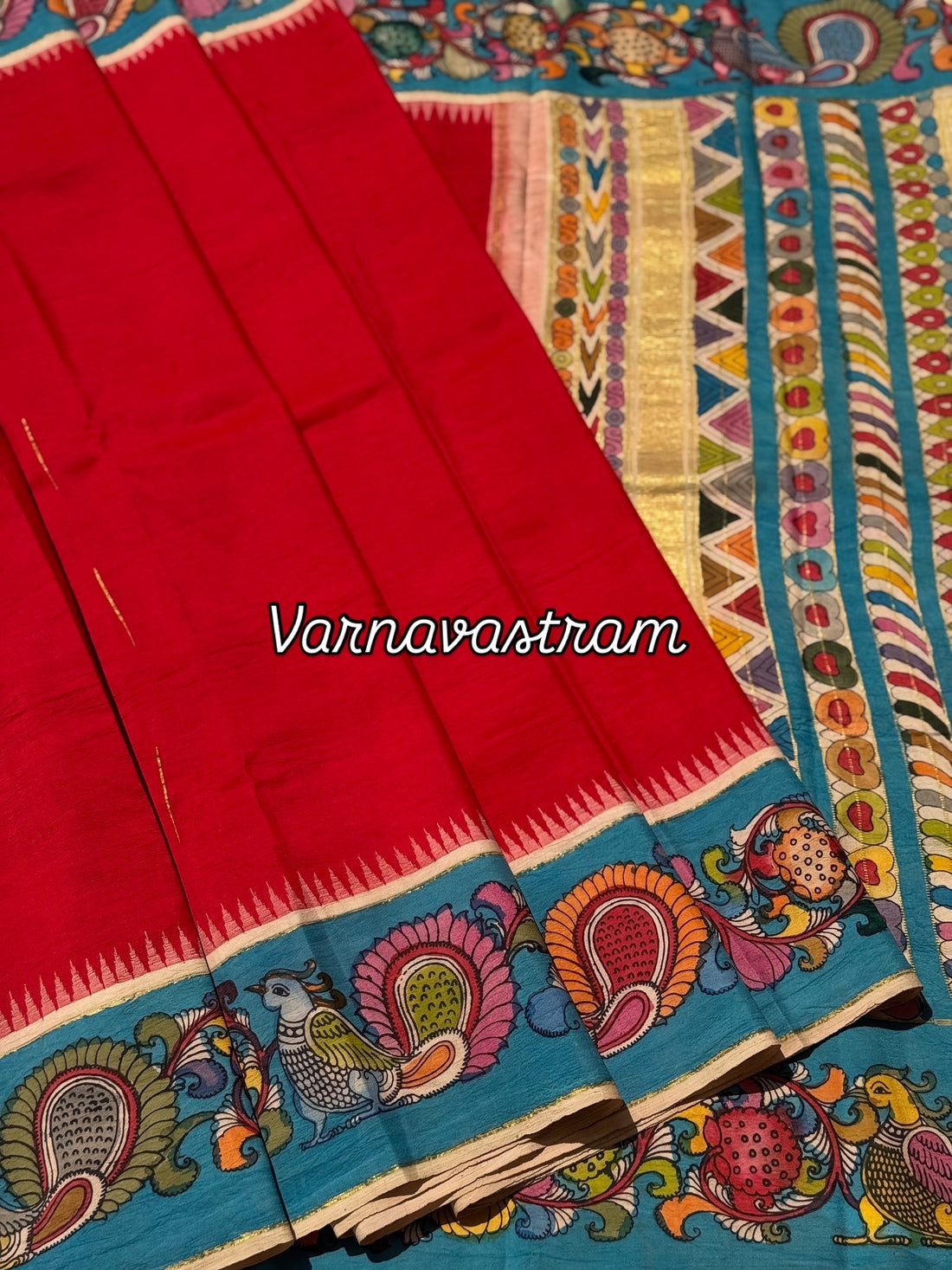 A gorgeous red korvai kanchivaram silk saree with korvai border Handdrawn and handpainted penkalamkari