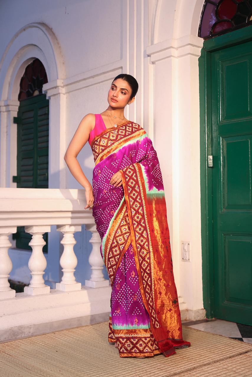 Intricate art piece blending Paithani Muniya with hand-knotted Bhandej and embellished with Kutch mirror work border