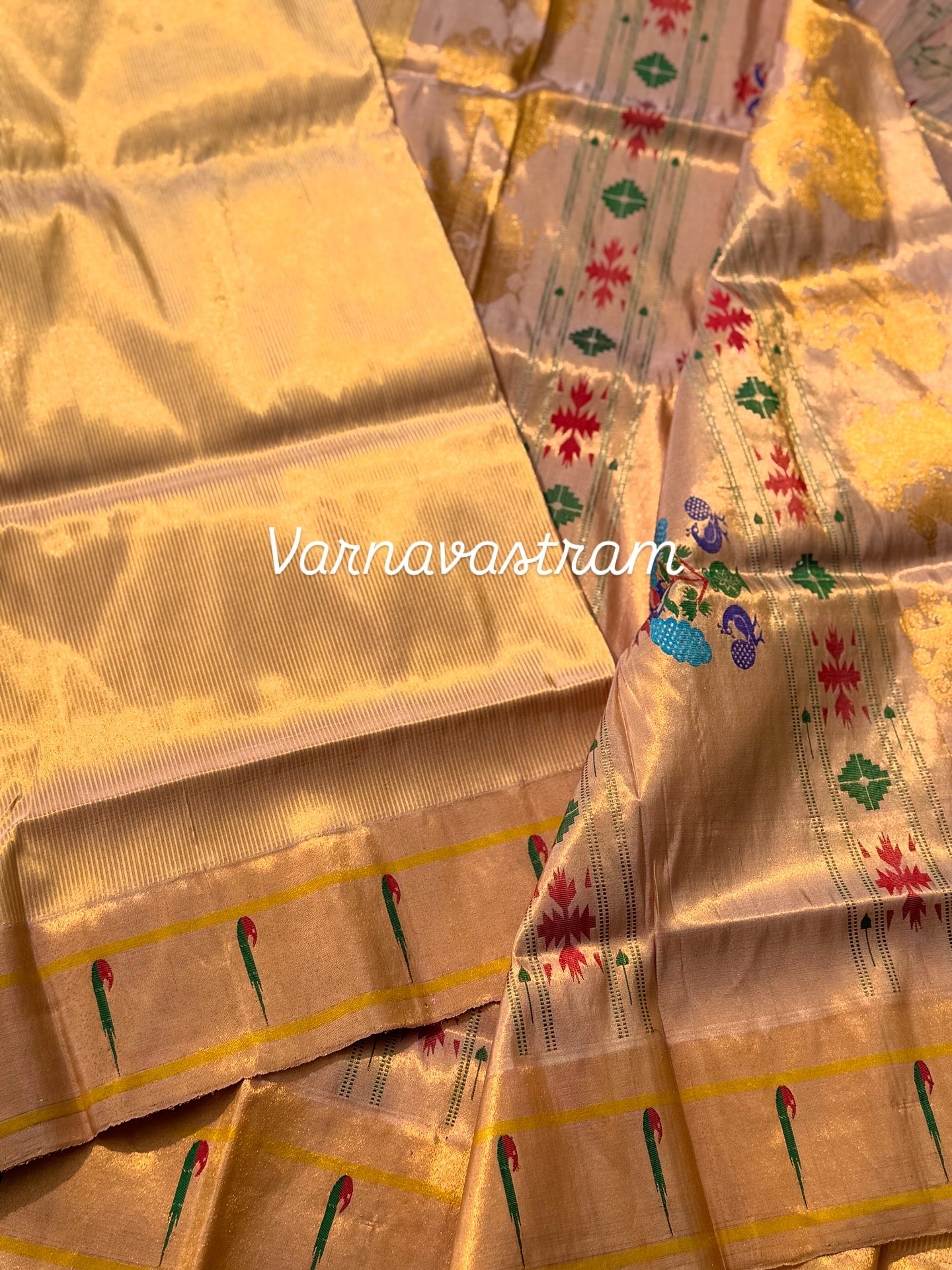 A stunner showstopper Handloom paithani tissue silk saree with single muniya border