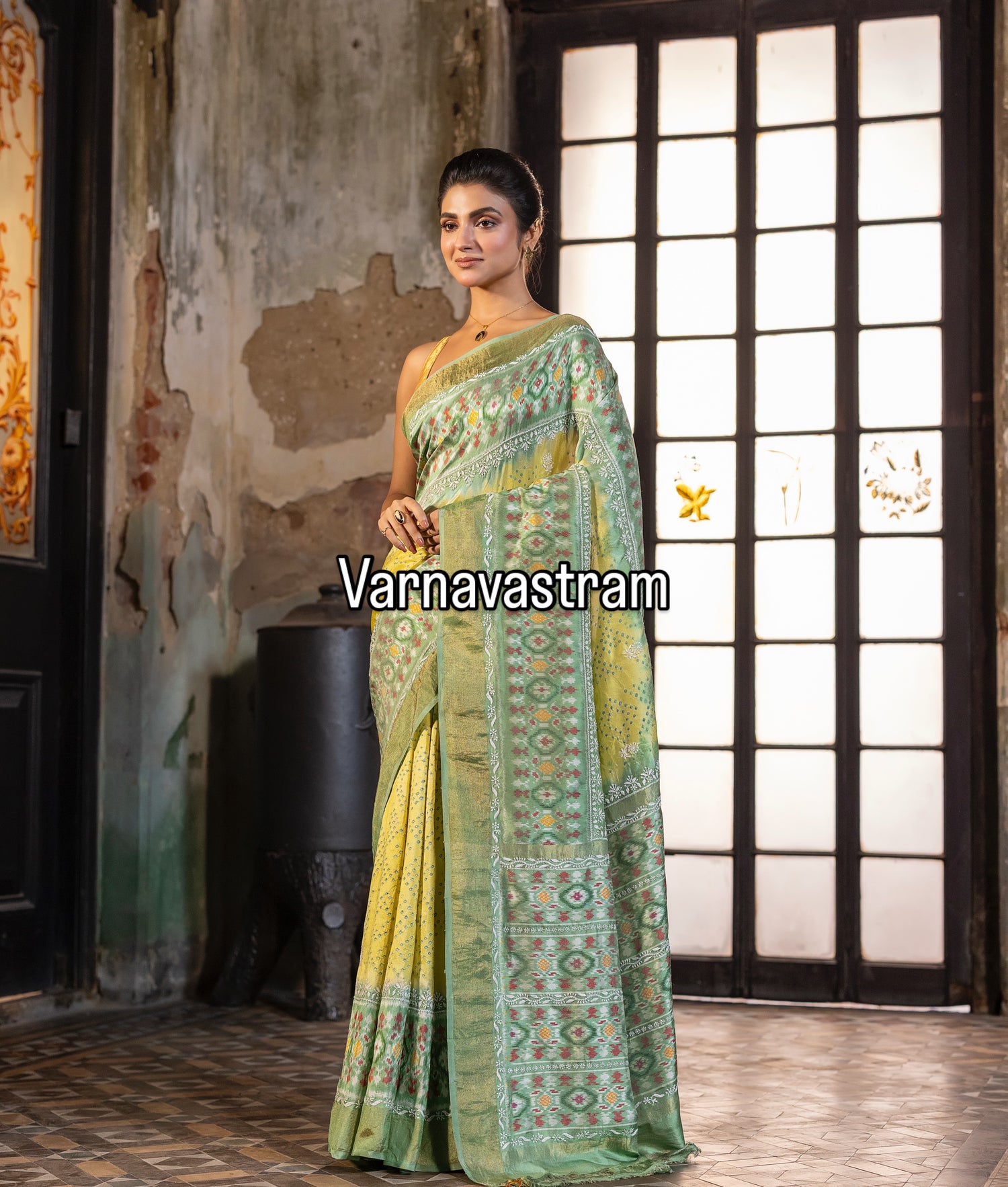 A mesmerising Bhandej inspired handwoven tie dyed ikkat silk SAREE with Bhandej inspired tie dyed patola ikkat weave