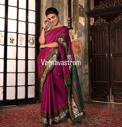 A plumpink kanchivaram weave silk saree with authentic Parsi gara work and handknotted rai Bhandej