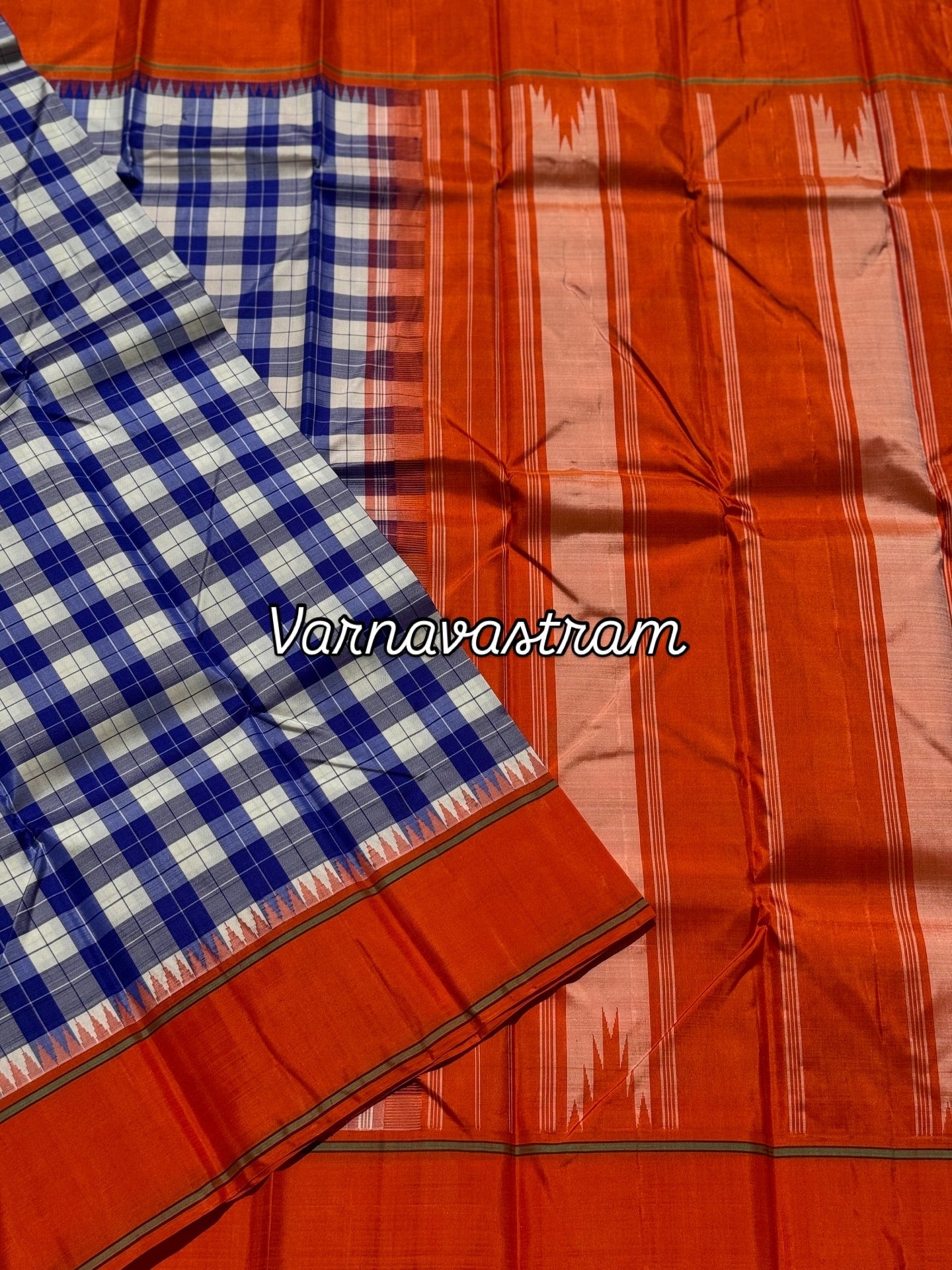 A gorgeous blue with offwhite Burberry checks temple korvai kanchivaram silk saree