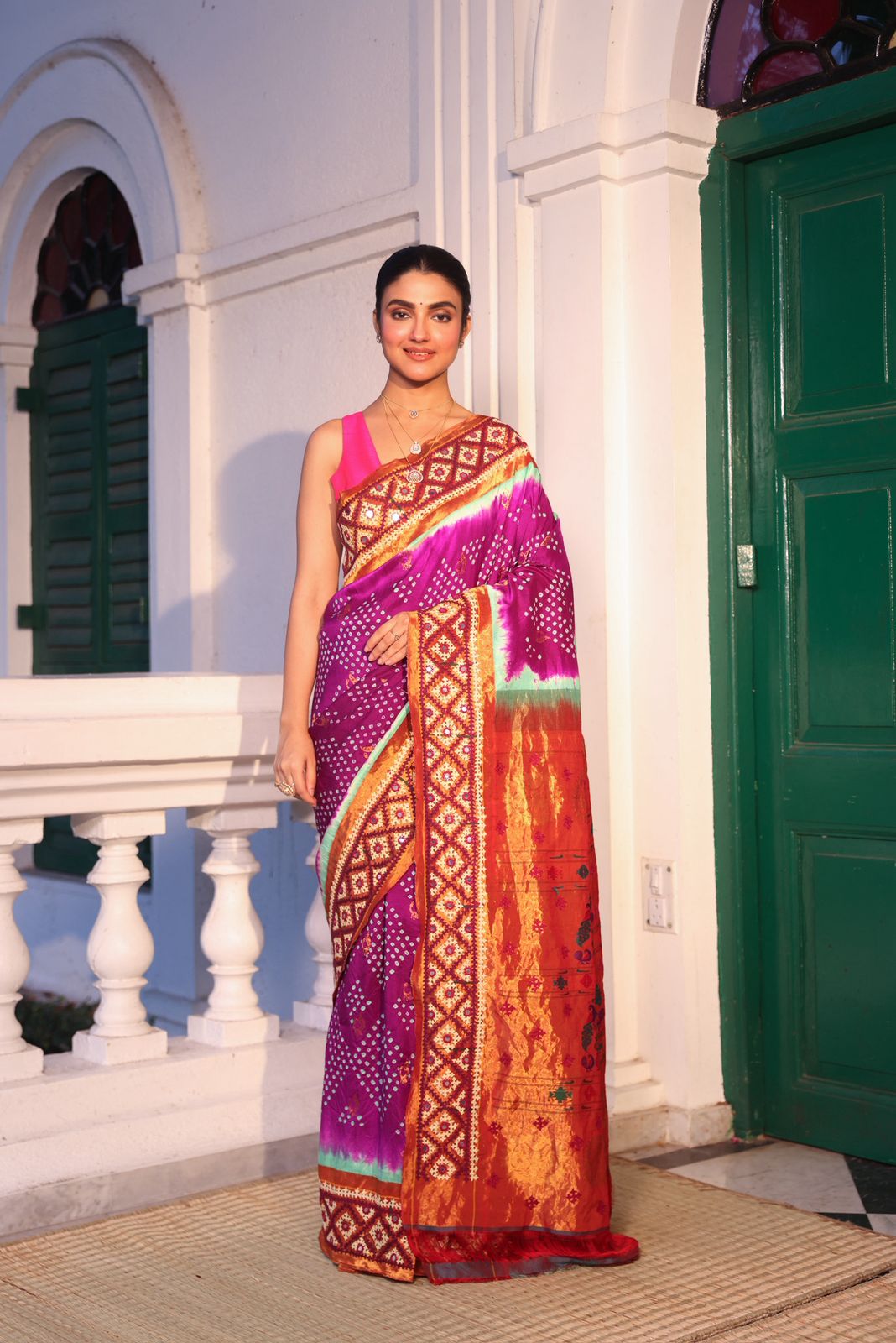 Intricate art piece blending Paithani Muniya with hand-knotted Bhandej and embellished with Kutch mirror work border