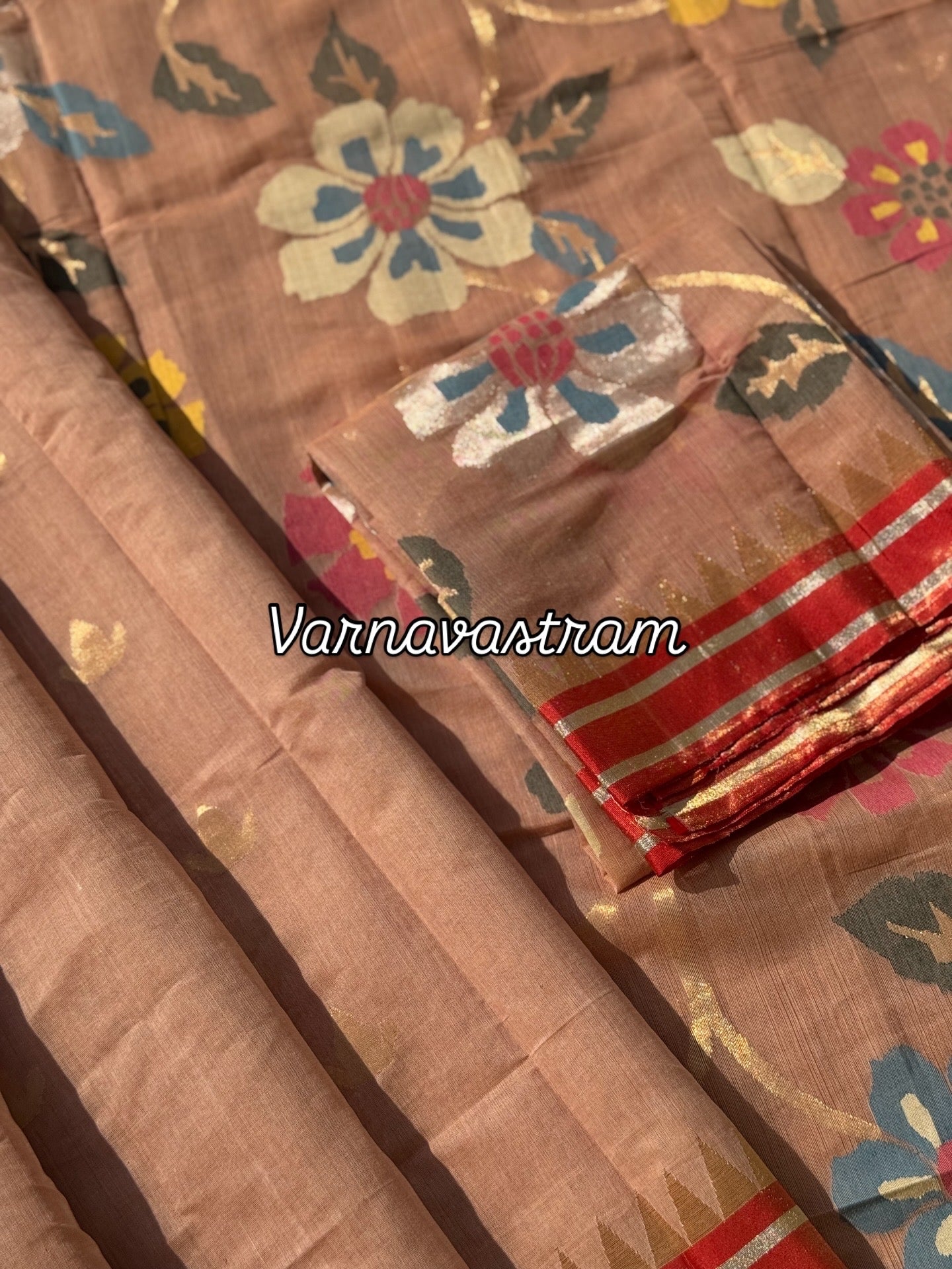 An elegant handspun ponduru Khadhi jamdani cotton saree in kaaki shade with red tissue Zari