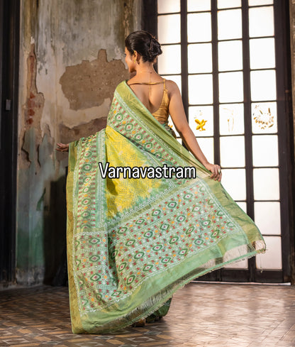 A mesmerising Bhandej inspired handwoven tie dyed ikkat silk SAREE with Bhandej inspired tie dyed patola ikkat weave