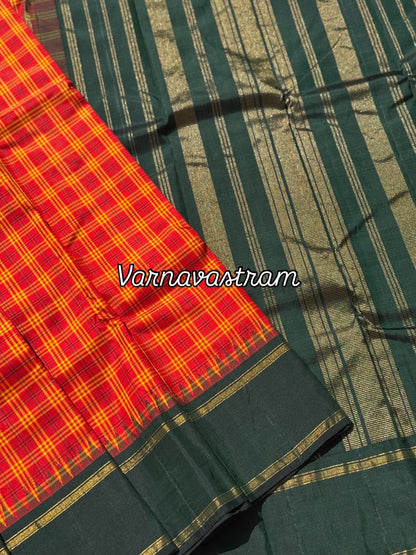 A pleasant tomato red with yellow kattam korvai kanchivaram silk saree