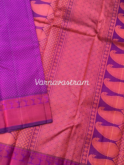 A gorgeous plum pink shade no zari kanchivaram silk saree with bambaramkan motifs