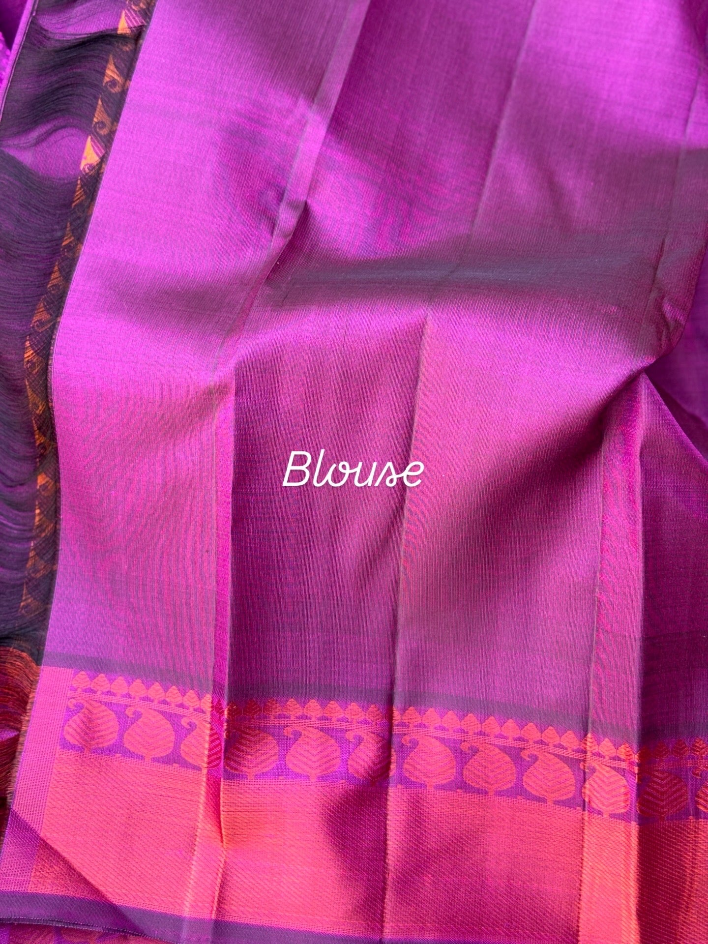 A gorgeous plum pink shade no zari kanchivaram silk saree with bambaramkan motifs