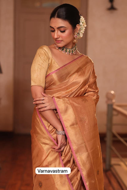 The most opulent and the celebrated weave in natural dyed fawn gold shade kanchivaram silk saree