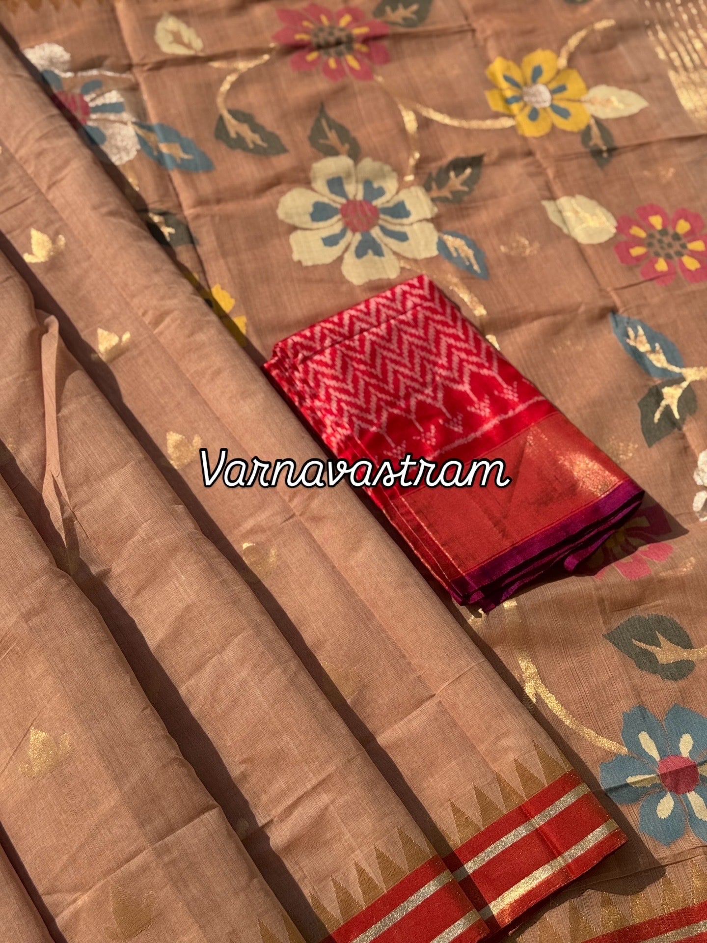 An elegant handspun ponduru Khadhi jamdani cotton saree in kaaki shade with red tissue Zari