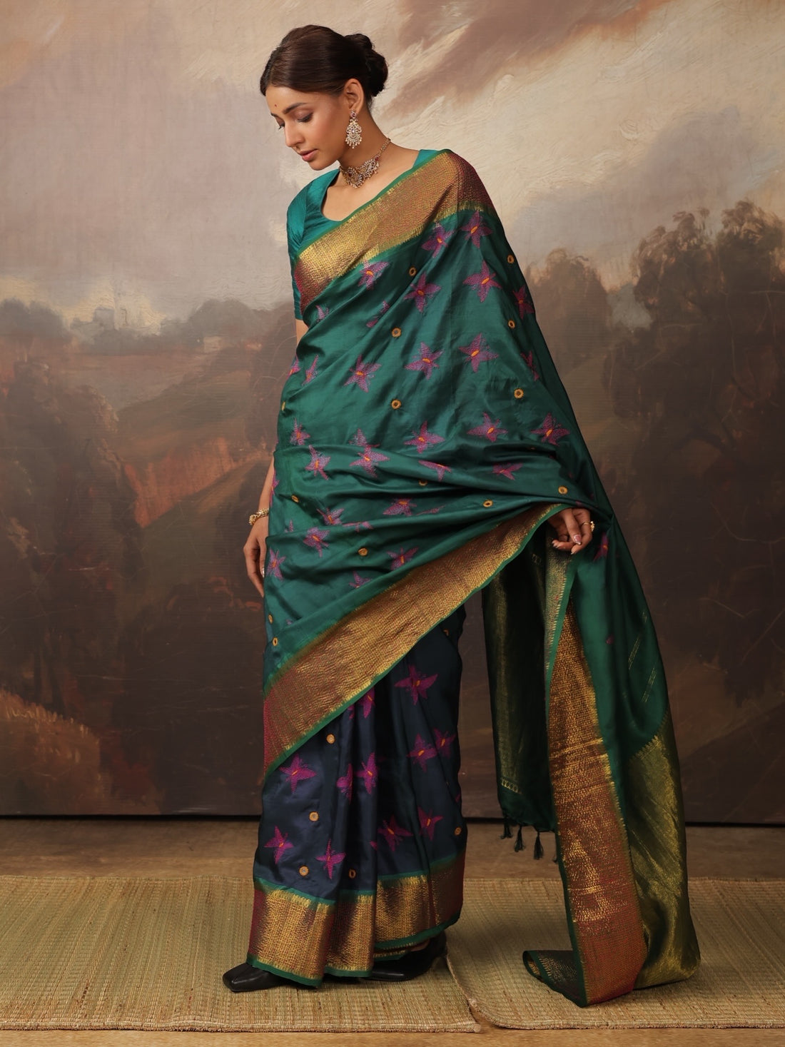 The korvai kanchivaram silk saree with hand stitched nui Shibori highlighted with Kantha hand embroidery