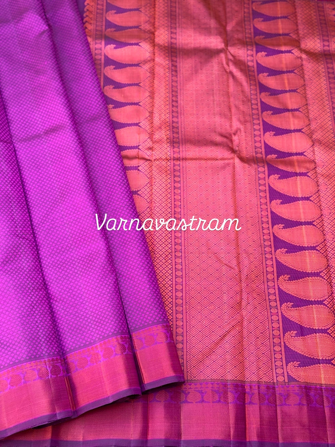 A gorgeous plum pink shade no zari kanchivaram silk saree with bambaramkan motifs