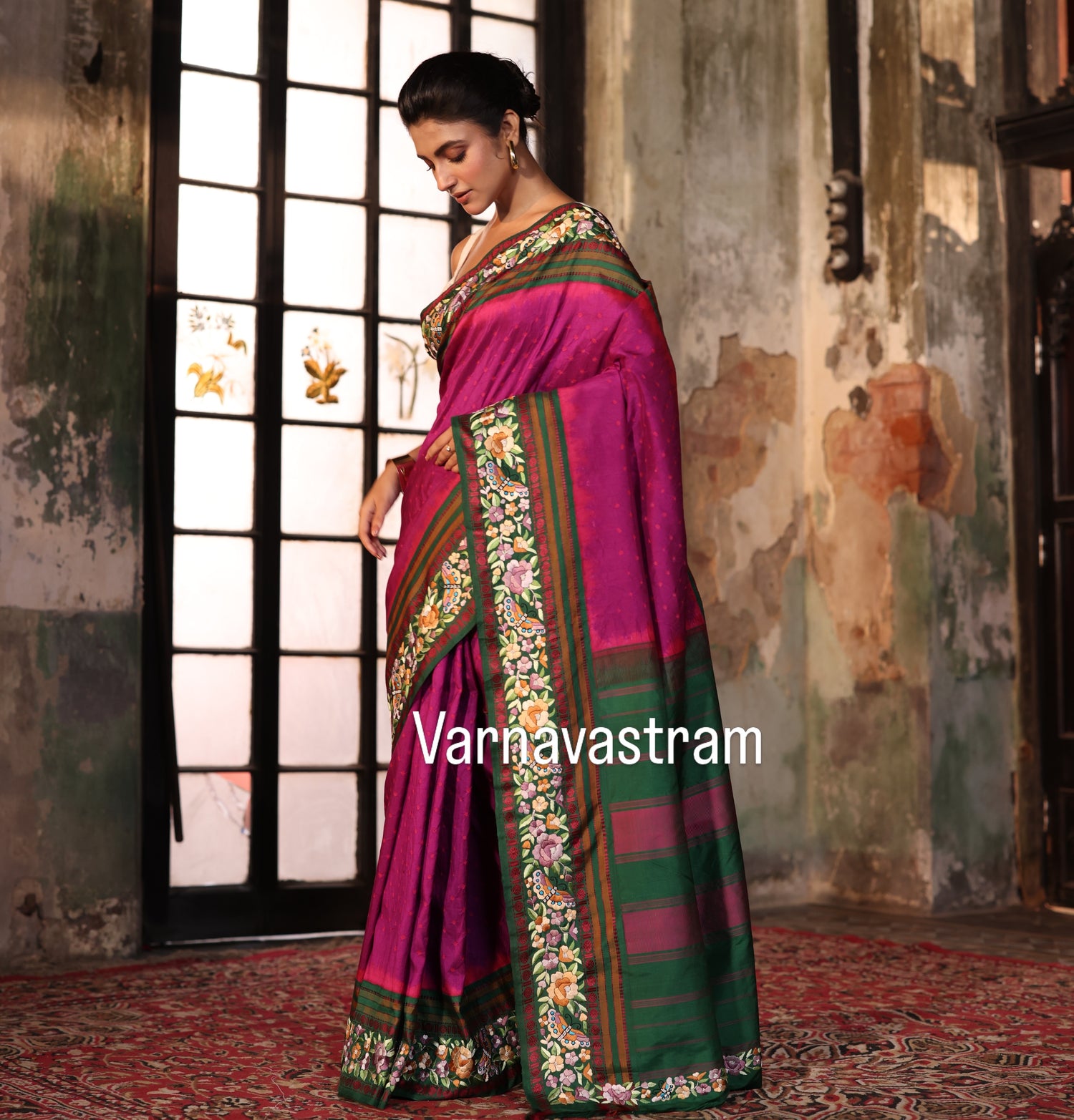A plumpink kanchivaram weave silk saree with authentic Parsi gara work and handknotted rai Bhandej
