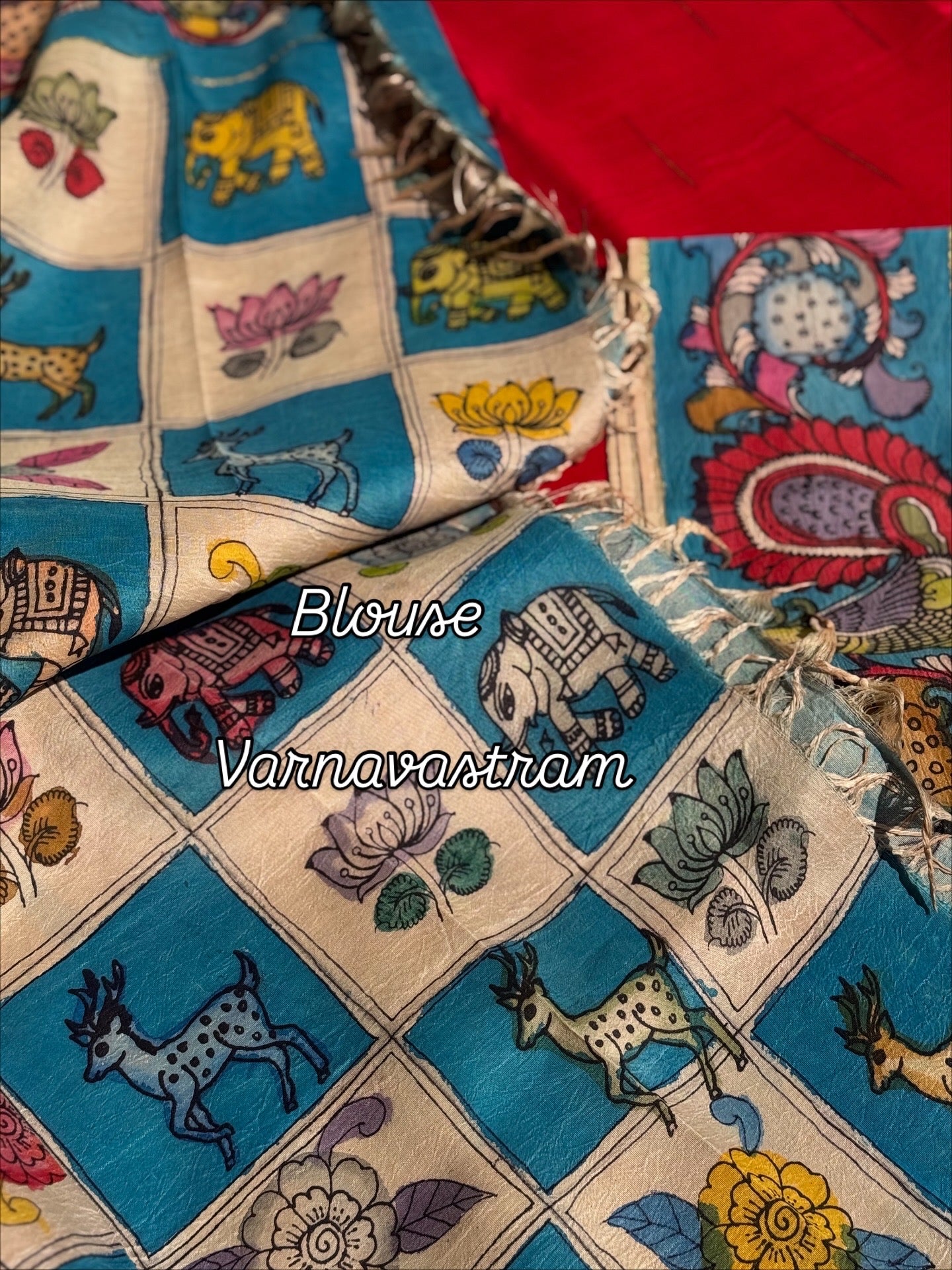 A gorgeous red korvai kanchivaram silk saree with korvai border Handdrawn and handpainted penkalamkari