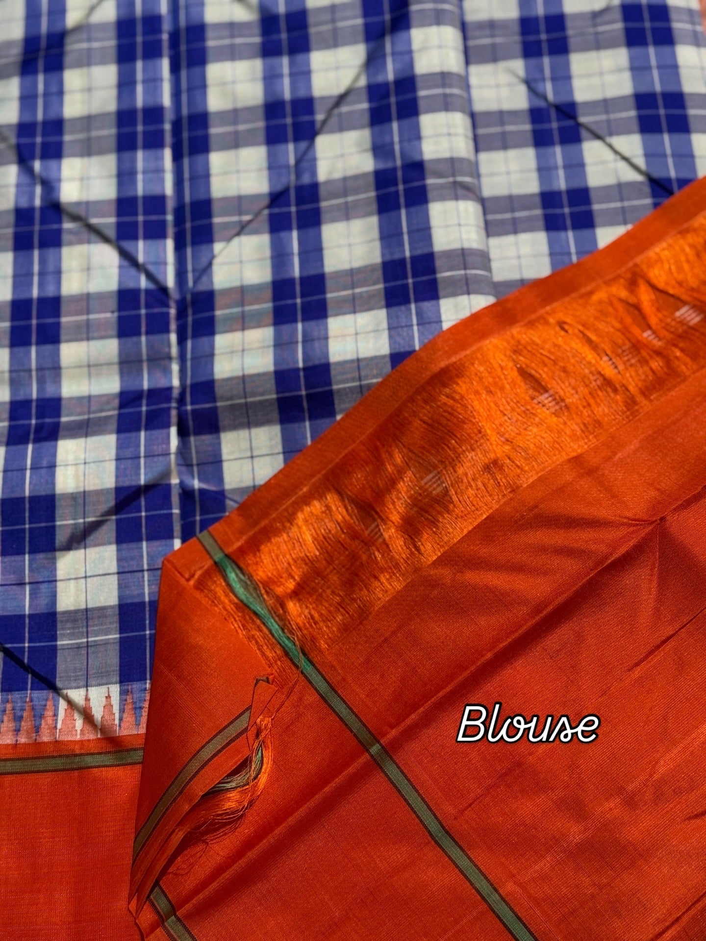 A gorgeous blue with offwhite Burberry checks temple korvai kanchivaram silk saree