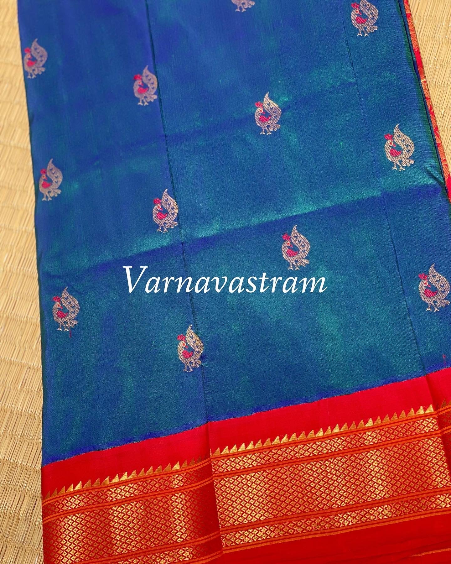 Paithani Silk Saree With Meenakari Buttas On Body With Kadiyal Border