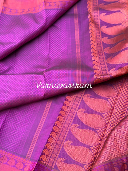 A gorgeous plum pink shade no zari kanchivaram silk saree with bambaramkan motifs