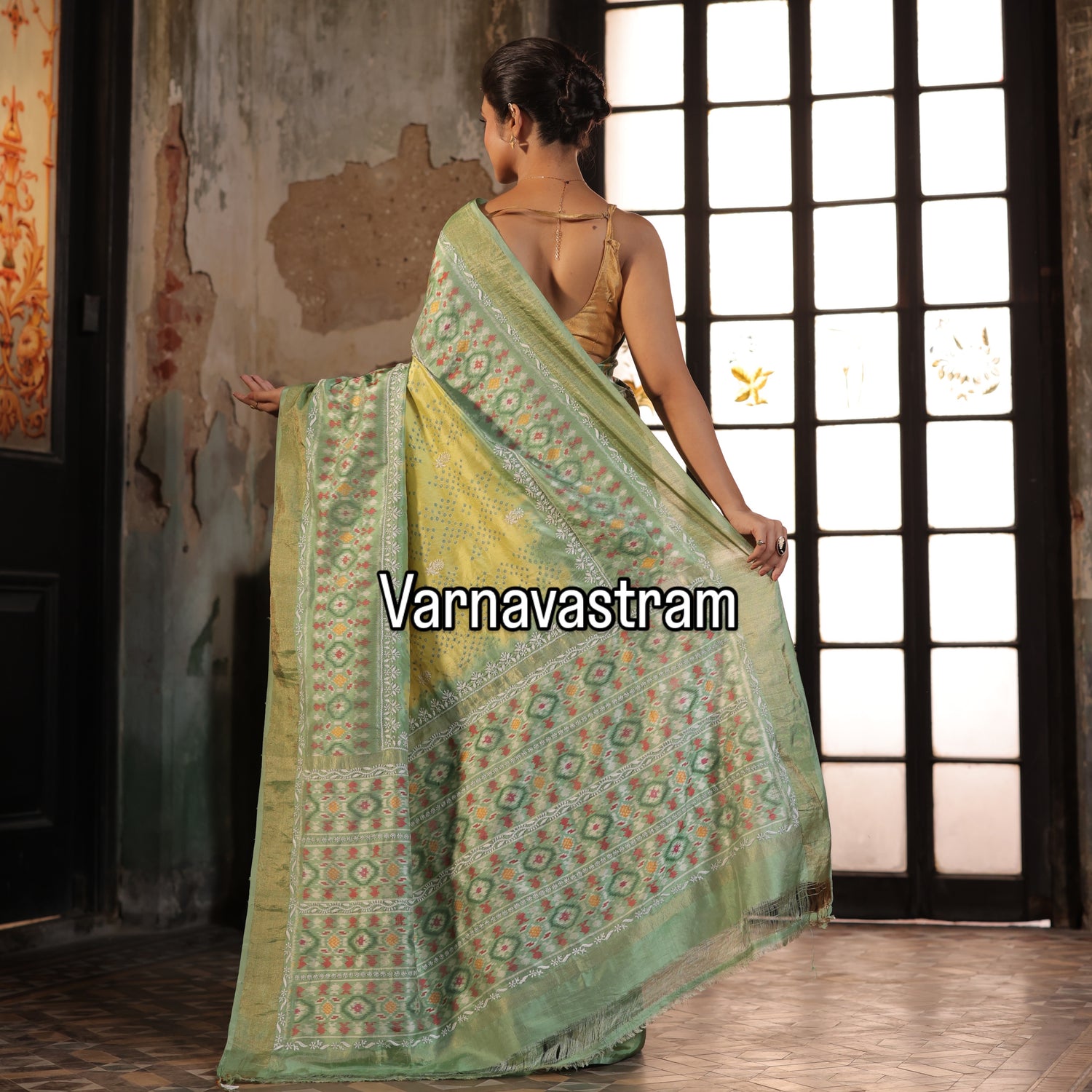 A mesmerising Bhandej inspired handwoven tie dyed ikkat silk SAREE with Bhandej inspired tie dyed patola ikkat weave
