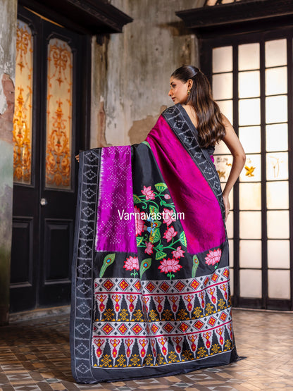 An elegant fusion crafted mulberry silk ikkat saree adorned with pichwai handpainted and tie dyed Bhandej