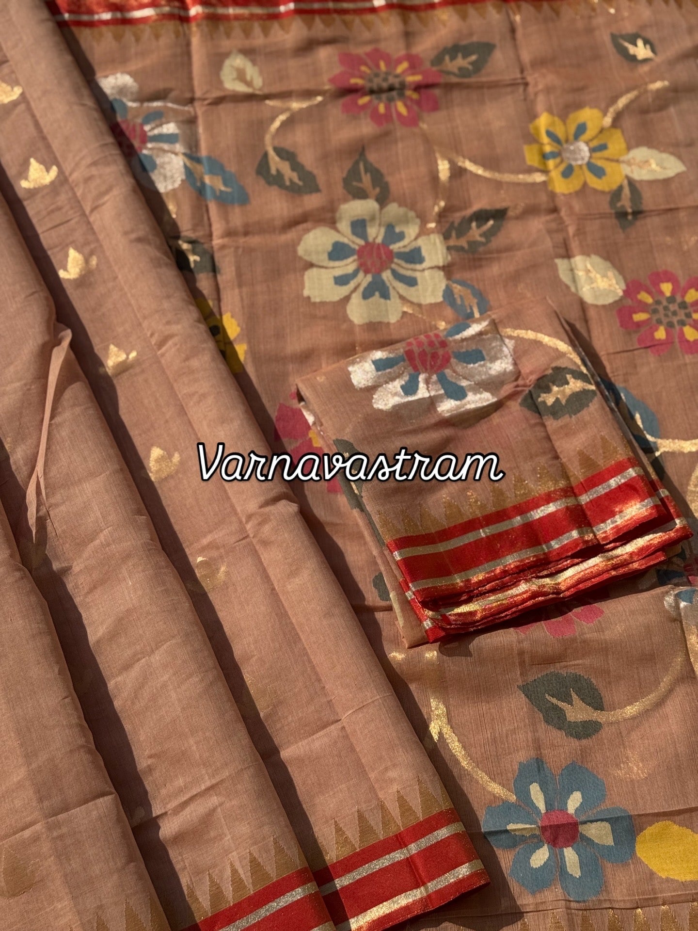An elegant handspun ponduru Khadhi jamdani cotton saree in kaaki shade with red tissue Zari