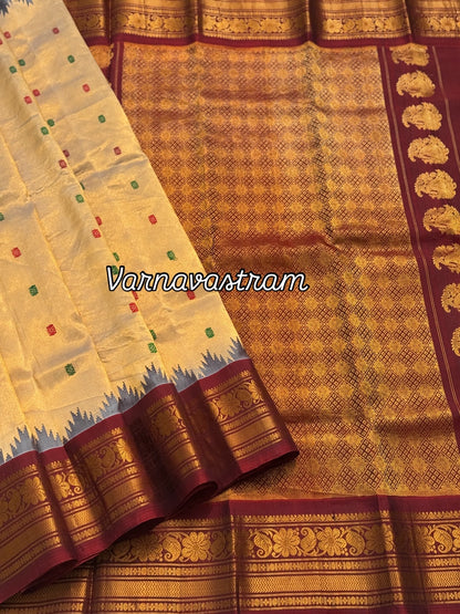 A stunner showstopper Handloom gadwal tissue silk saree with kuttu border