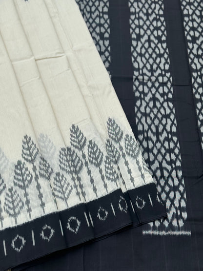 Ivory and  black handwoven weft single ikkat cotton saree