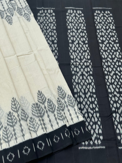 Ivory and  black handwoven weft single ikkat cotton saree