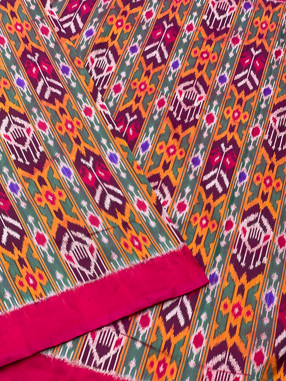 Multicoloured Pure mulberry silk Uzbek motifs inspired tie dyed ikkat fabric available as yardages