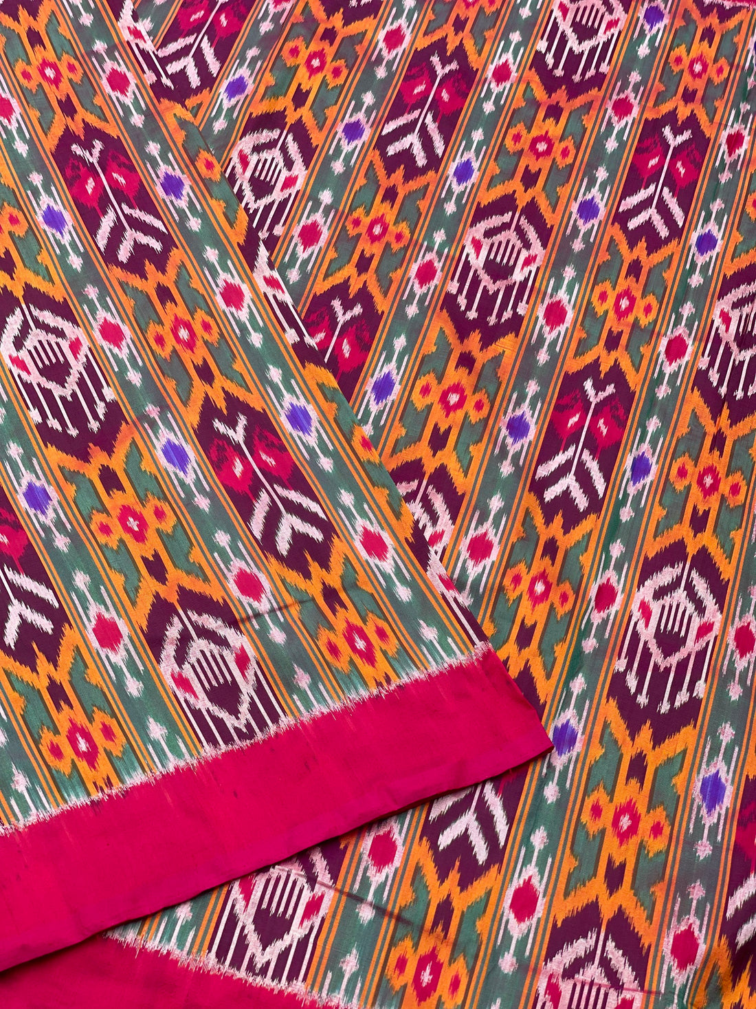 Multicoloured Pure mulberry silk Uzbek motifs  inspired tie dyed ikkat fabric available as yardages