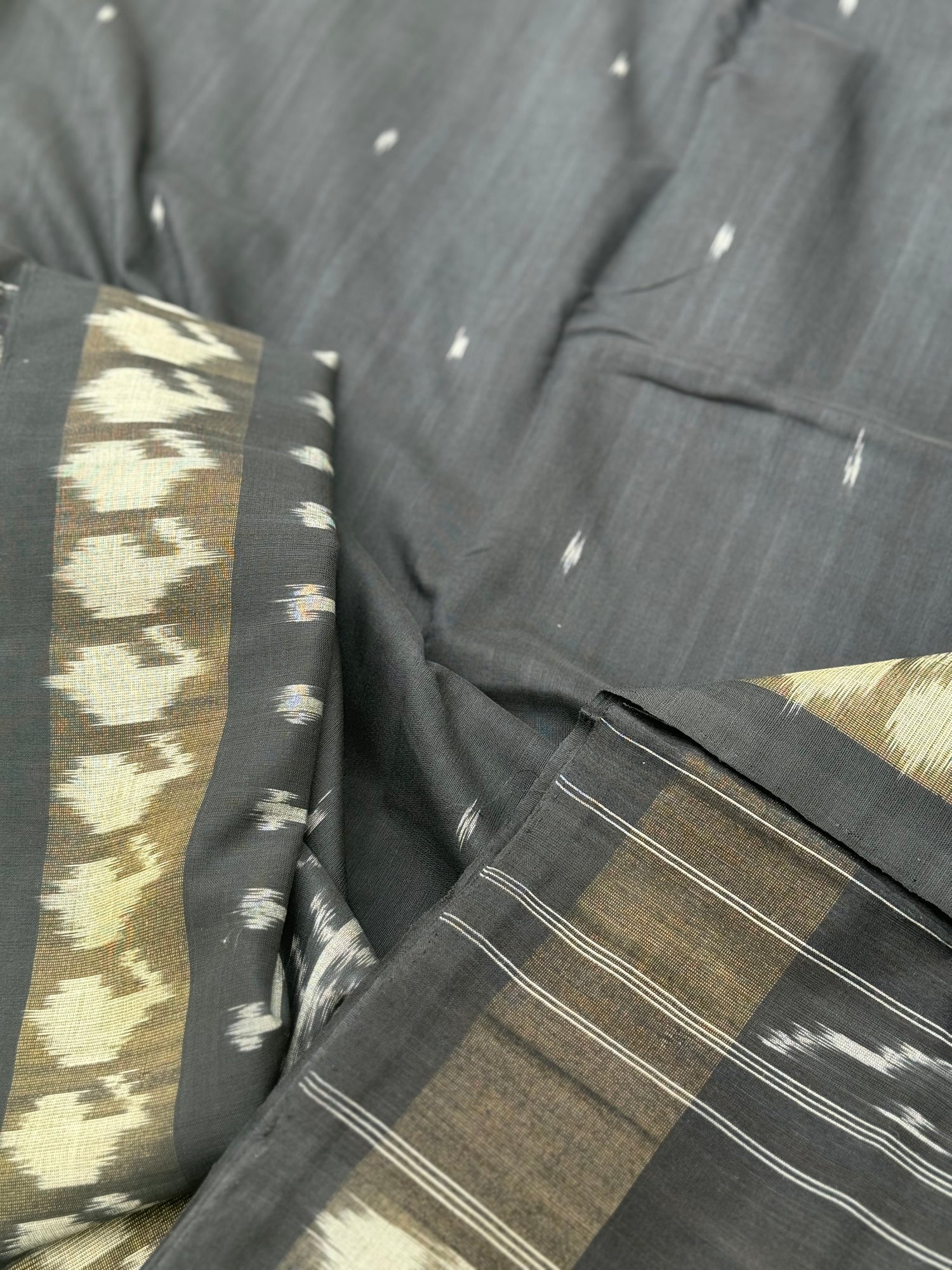 Black zari border handwoven weft single ikkat cotton saree