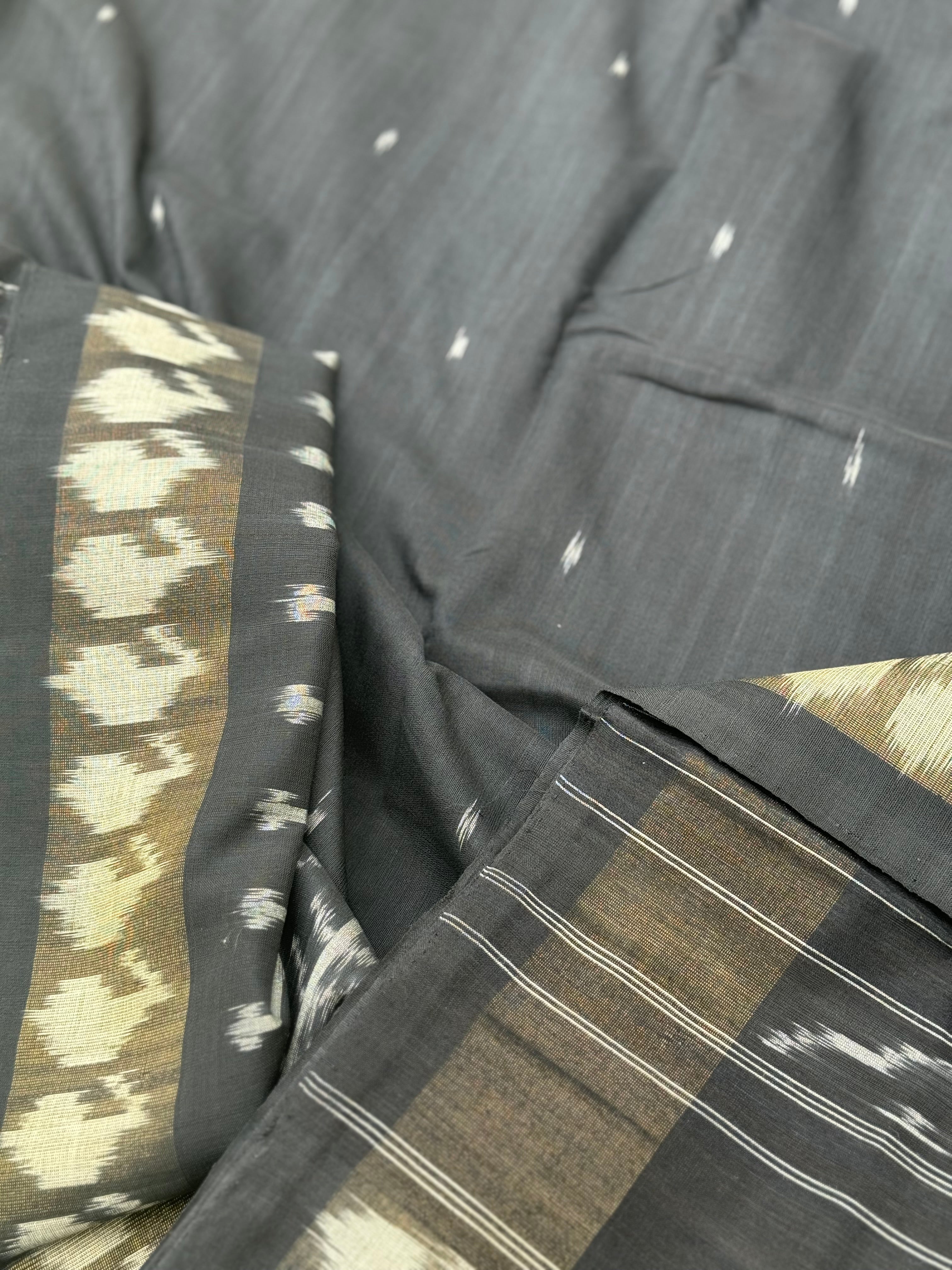 Black zari border handwoven weft single ikkat cotton saree