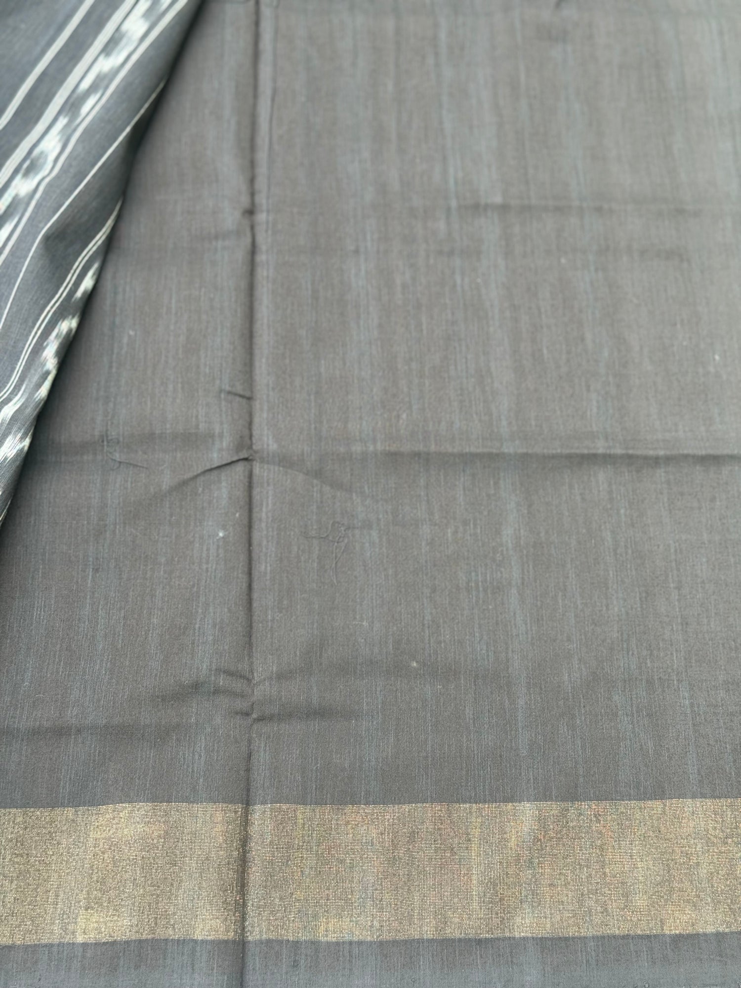 Black zari border handwoven weft single ikkat cotton saree