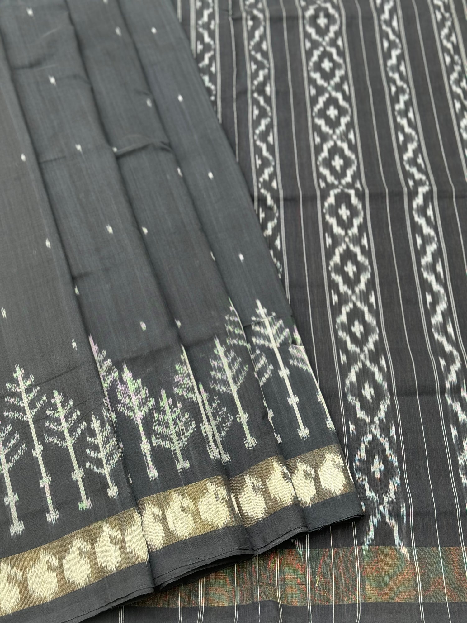 Black zari border handwoven weft single ikkat cotton saree
