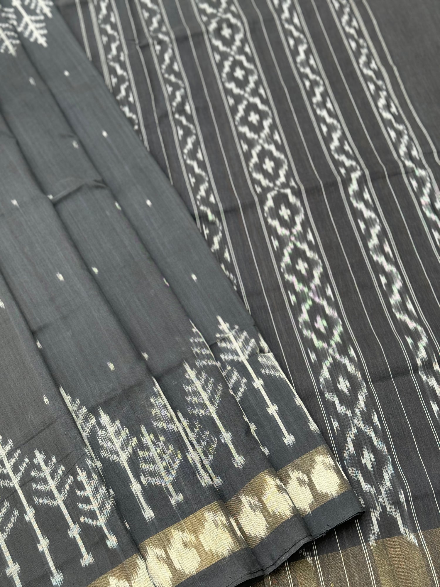 Black zari border handwoven weft single ikkat cotton saree
