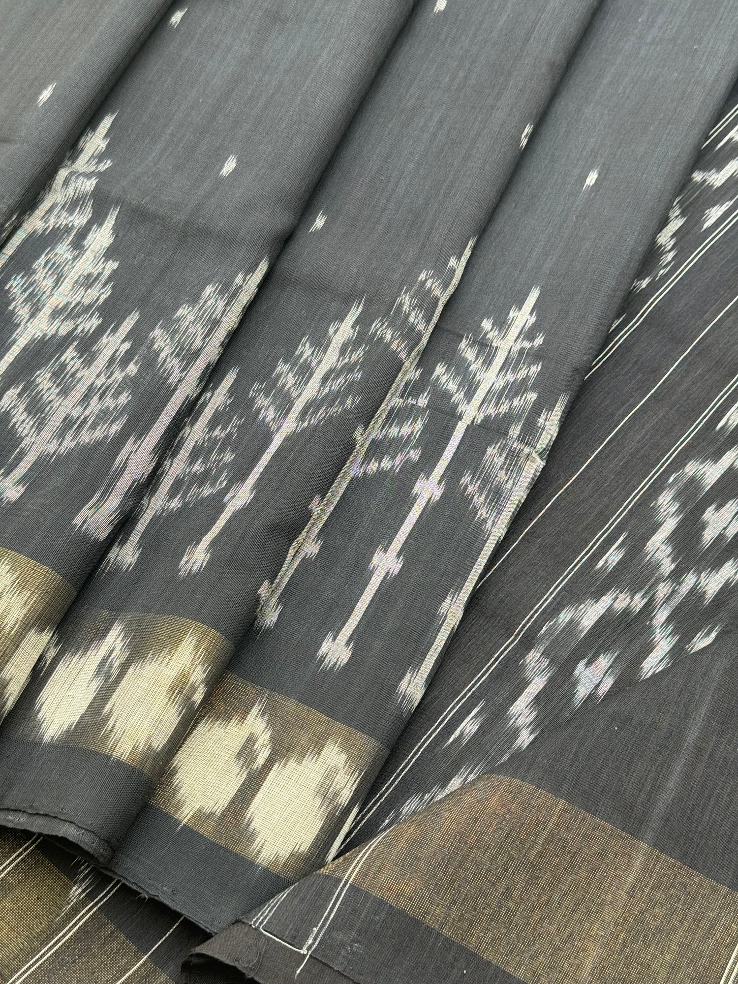 Black zari border handwoven weft single ikkat cotton saree